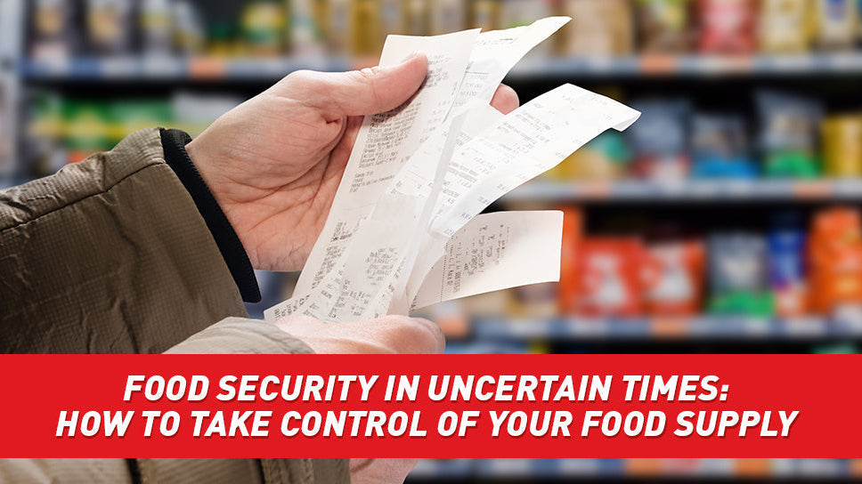 A person holding a long receipt in a grocery store.