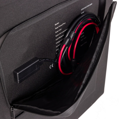 Image of Pocket on the carrying case filled with cords and cables.