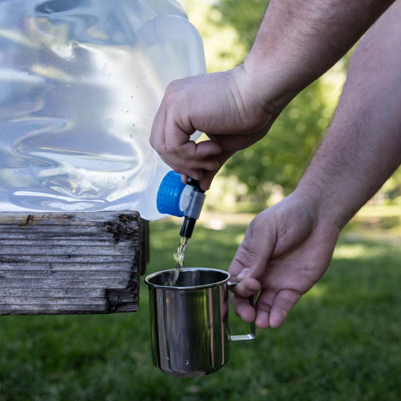 A man uses the 5-Gallon Collapsible Water Conatiner