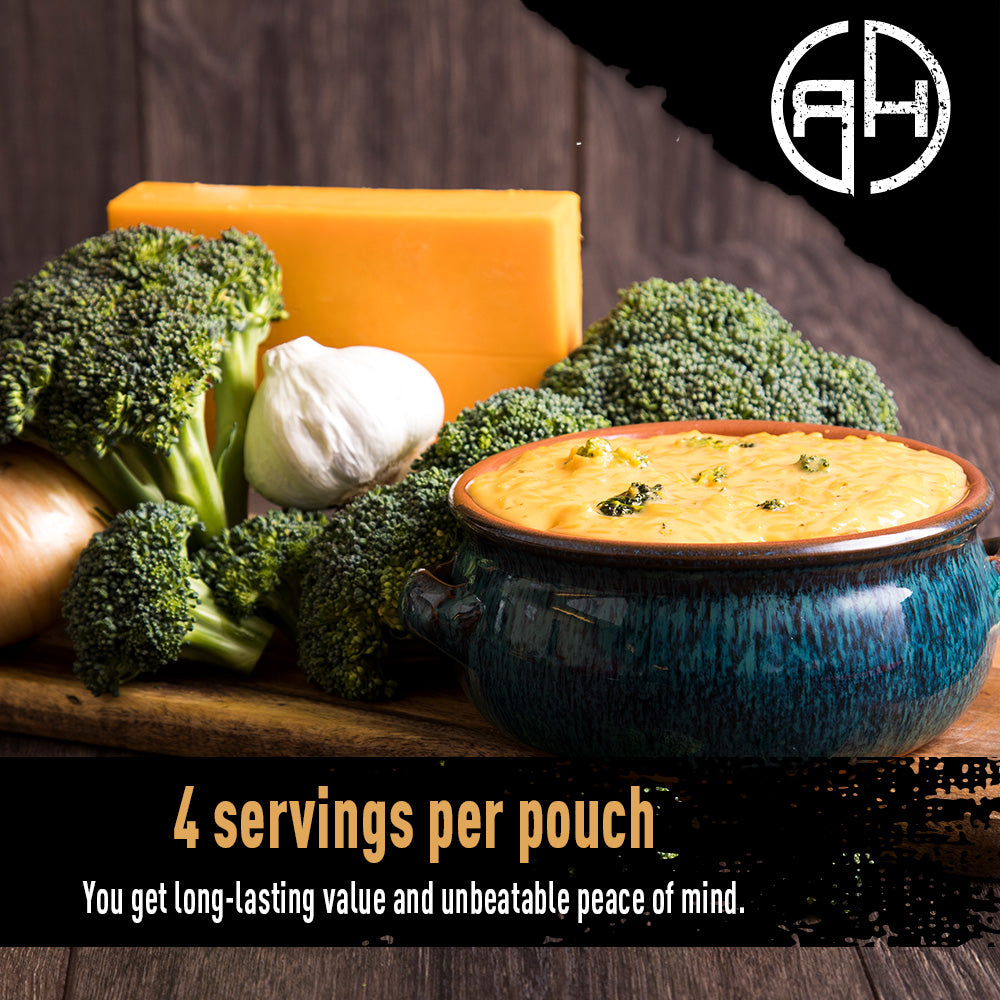 Bowl of creamy soup with broccoli and cheese on a wooden surface