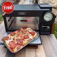 Thumbnail for Portable ember stove cooking a pizza with Independence Day Bundle