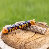 Thumbnail for instafire fire rope on a log outside