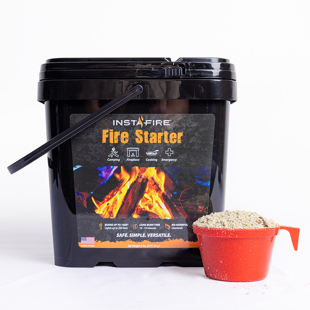 InstaFire Fire Starter & Fuel black 2-gallon bucket with orange scoop filled with fire starter granules.