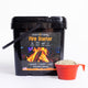 InstaFire Fire Starter & Fuel black 2-gallon bucket with orange scoop filled with fire starter granules.
