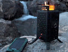 InstaFire Inferno Pro Stove powered by USB while charging from a portable solar panel outdoors