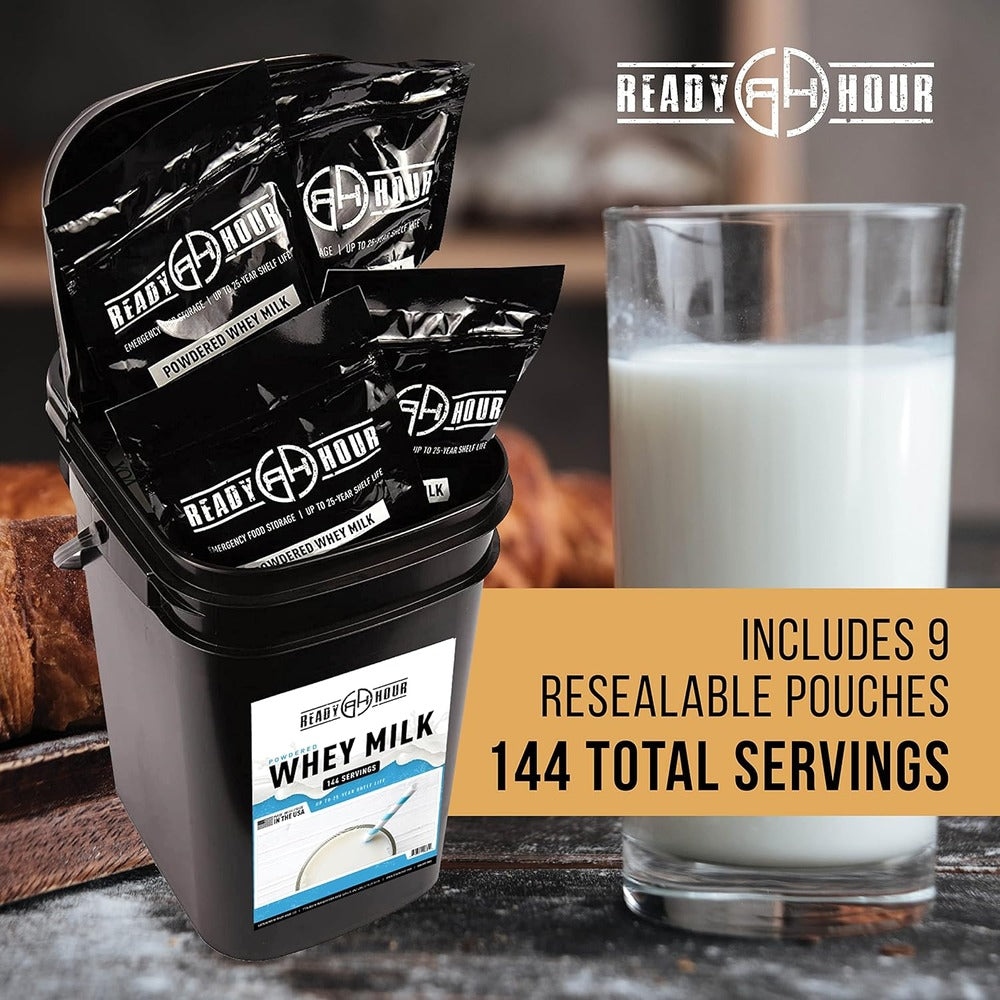 9 pouches of whey milk powder in a bucket next to a glass of white milk