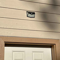 Thumbnail for Solar light mounted above door