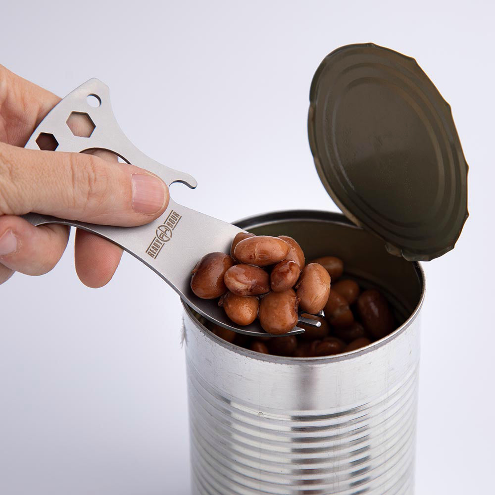 grub n tool being used to open a can of bean