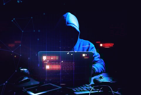A hacker getting into electronic systems.