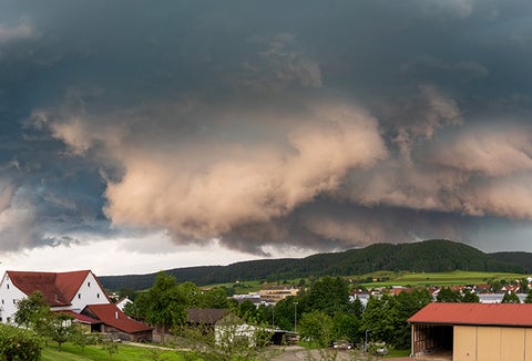 A stormy sky above a remote village.