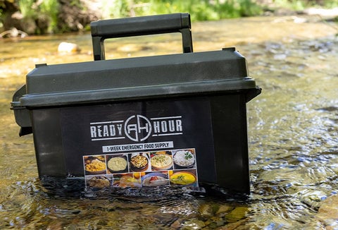 A 1-Week Food Supply Ammo Can from My Patriot Supply floating in a river.