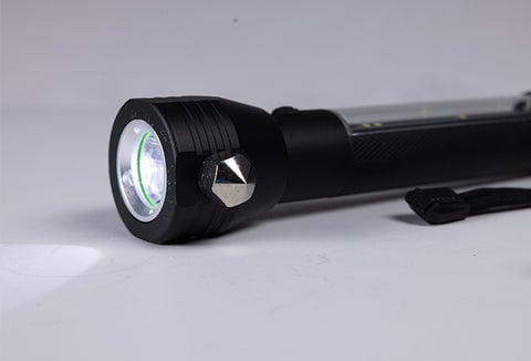 A lit flashlight.