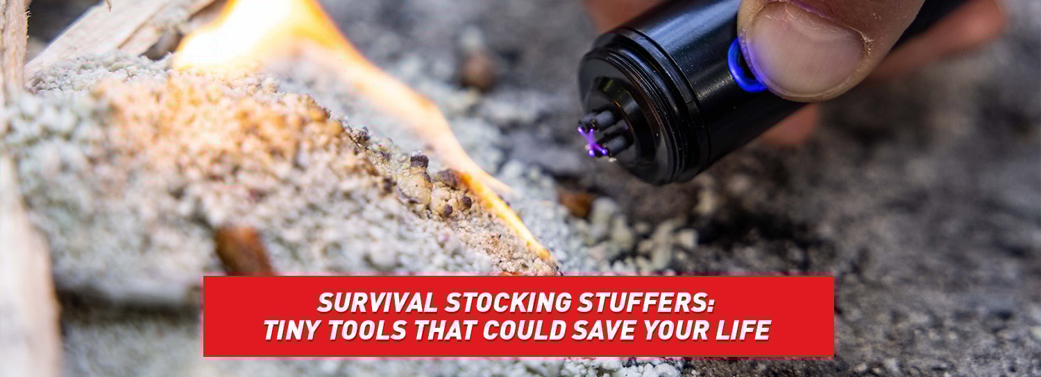 Someone using a plasma lighter to light granules of fire-starting material.