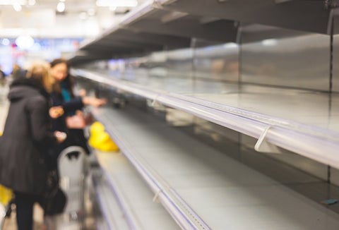 Empty shelves in a grocery store.