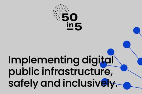 A gray background with blue circles in the corner from the 50 in 5 website.