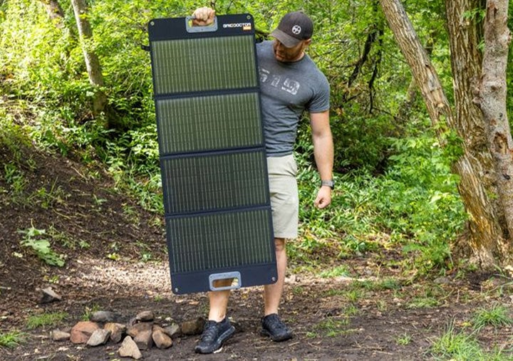Photo: Solar panel size comparable to a tall man