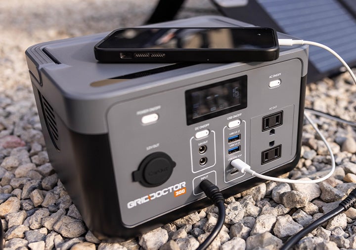 Photo: Phone plugged into generator